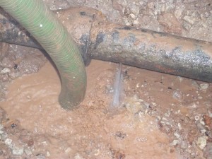 Water leaking from pin hole in pipe